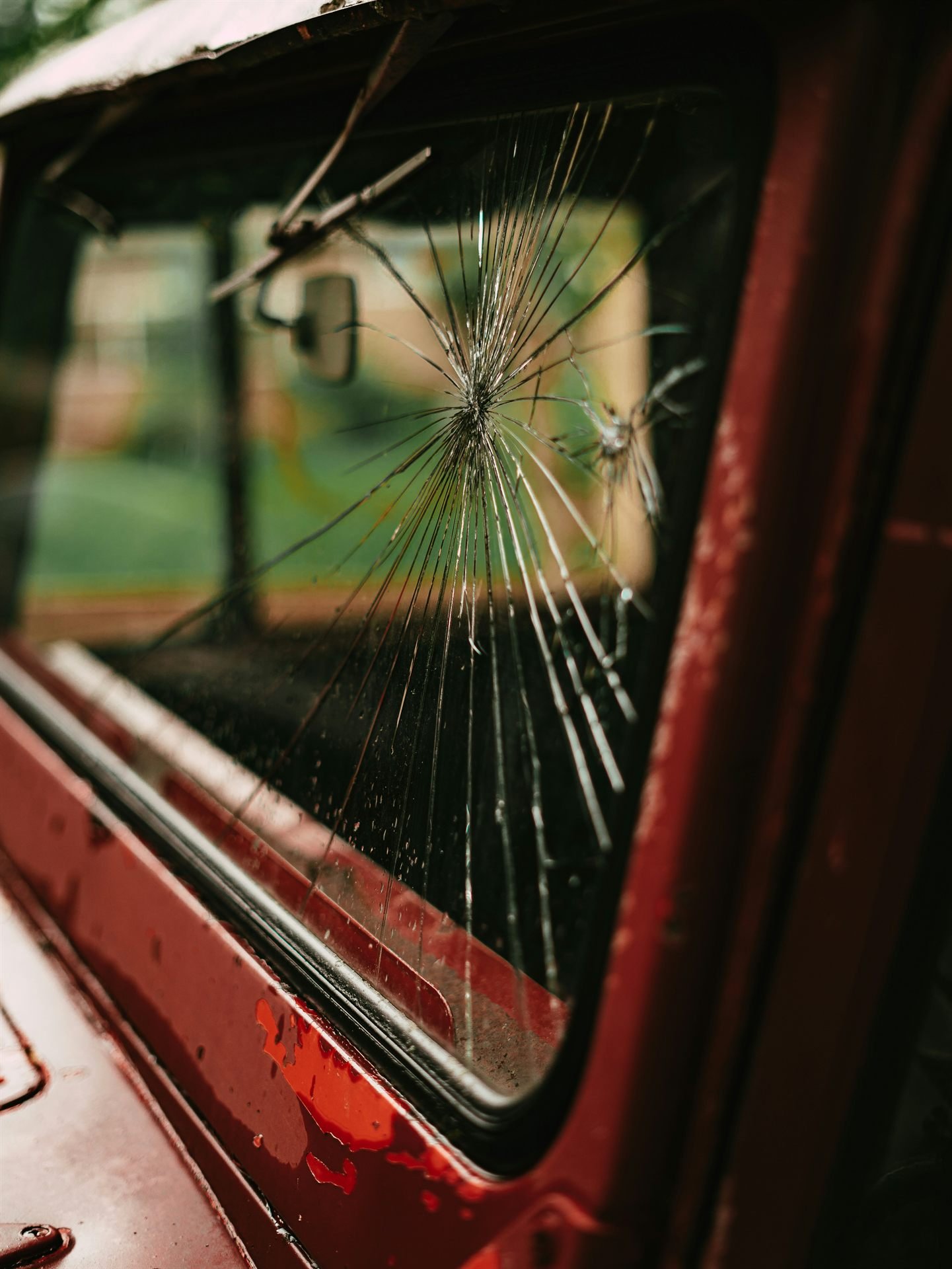 Technician replacing windshield